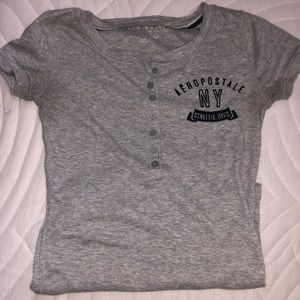 gray top with buttons